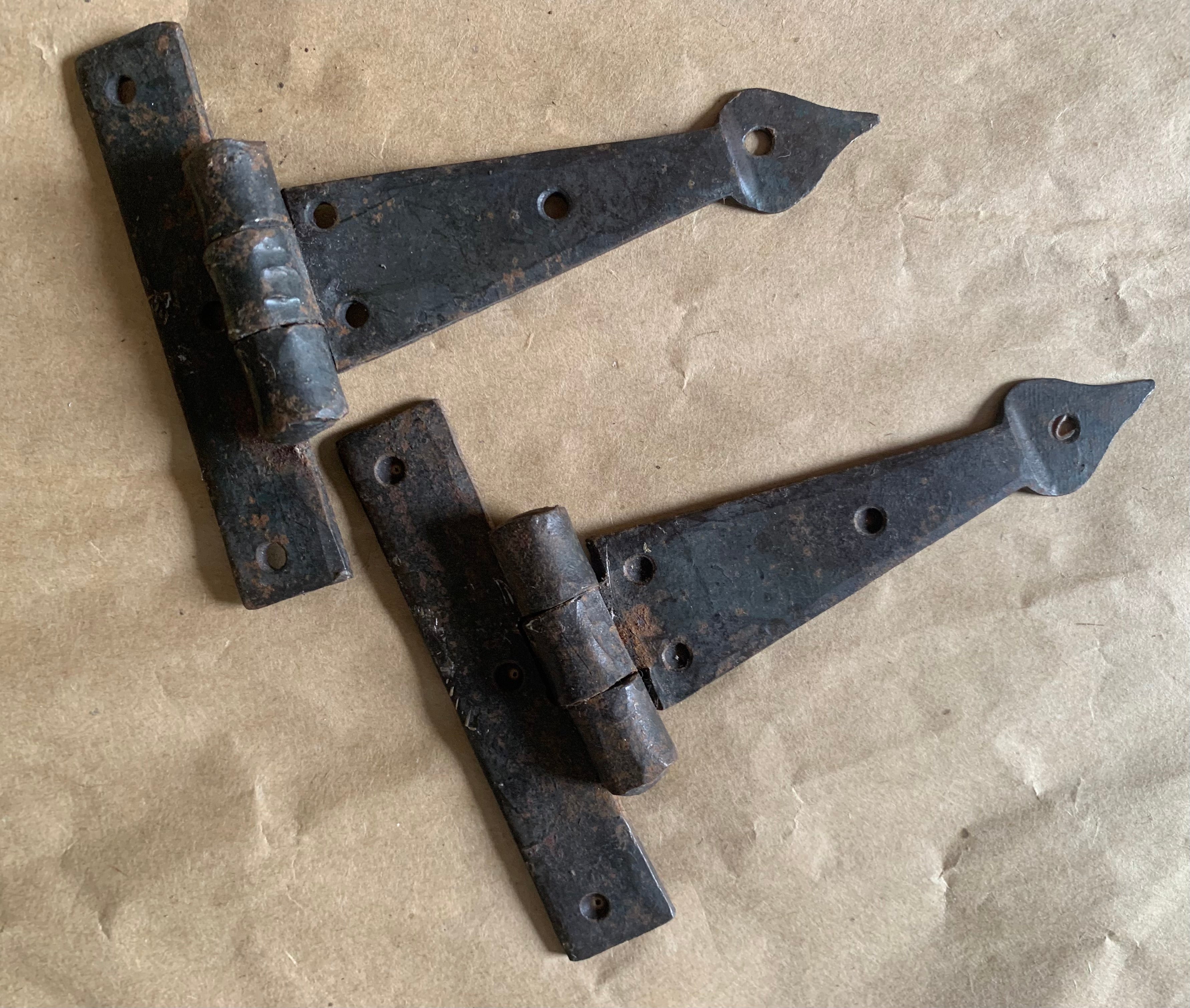 To clear, small pair of Arrow-head handmade hinges