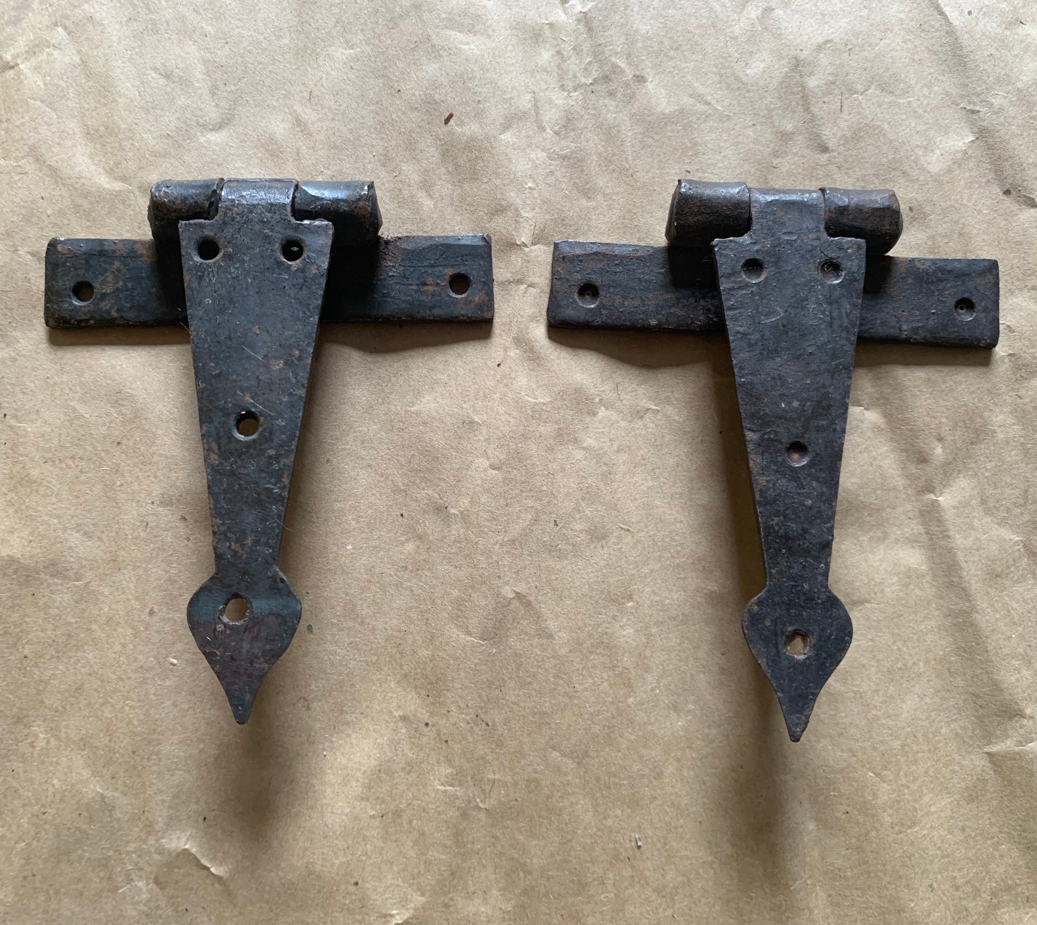 To clear, small pair of Arrow-head handmade hinges