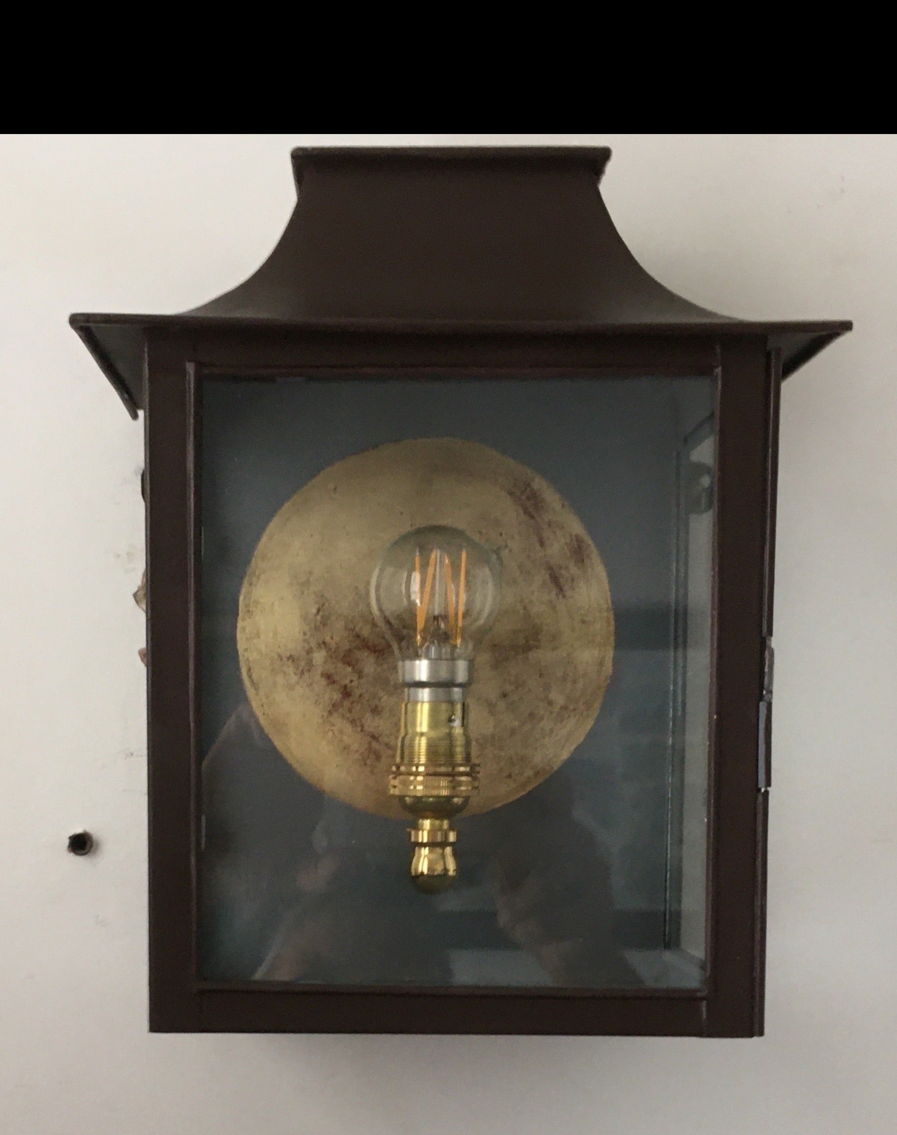 Painted tin lantern with Gilt circle.