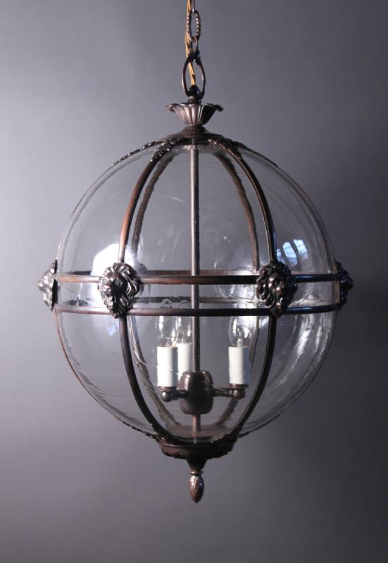 Large Brass Framed Globe Lantern with Lion Heads