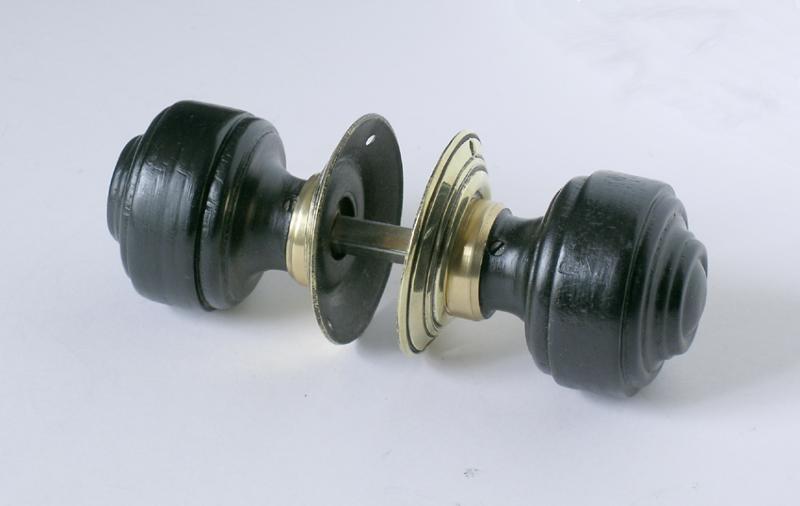 Ebonised Colonial knob set with brass backplates