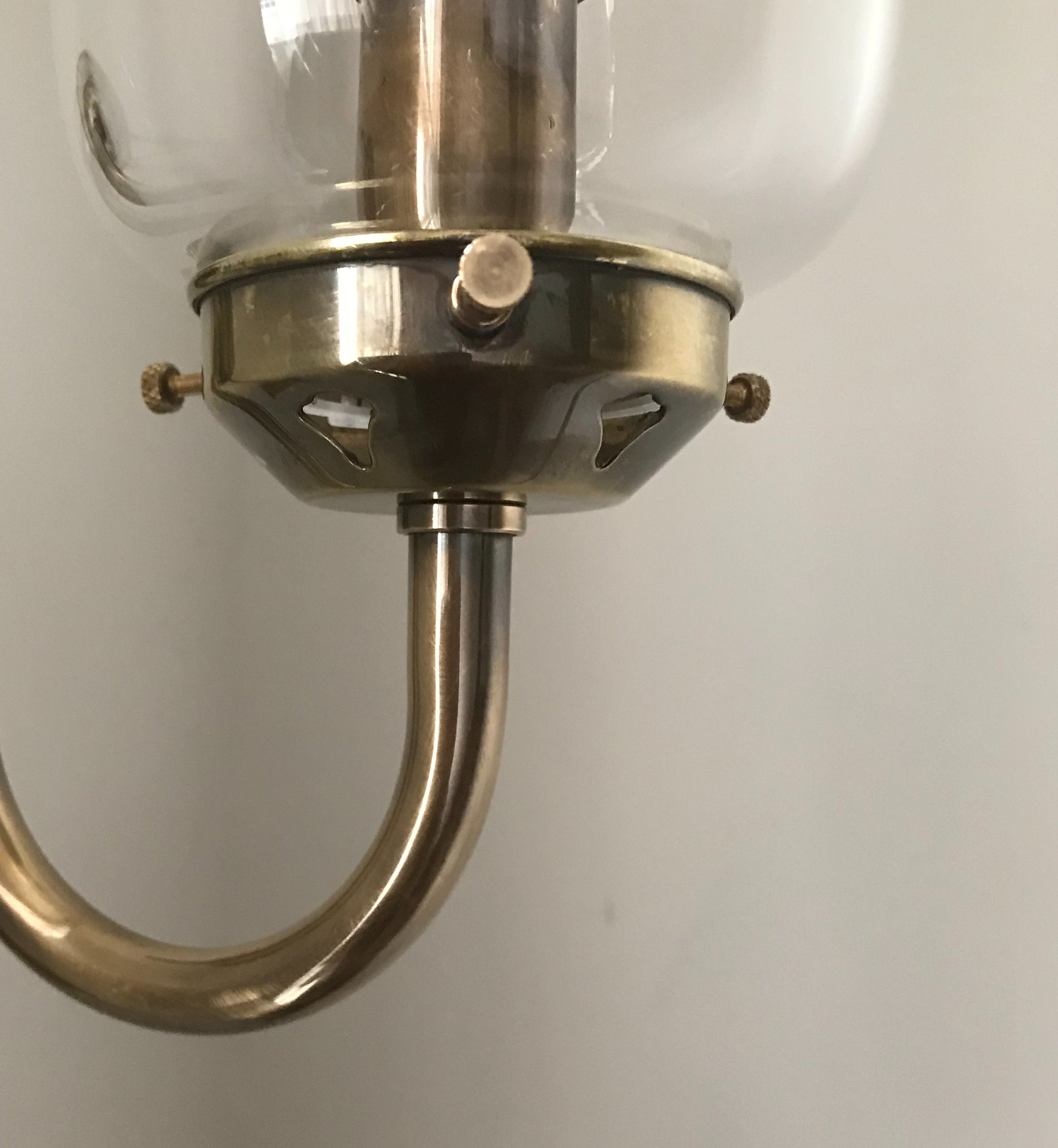 Aged Brass Finish Storm  Wall Light with Clear Glass