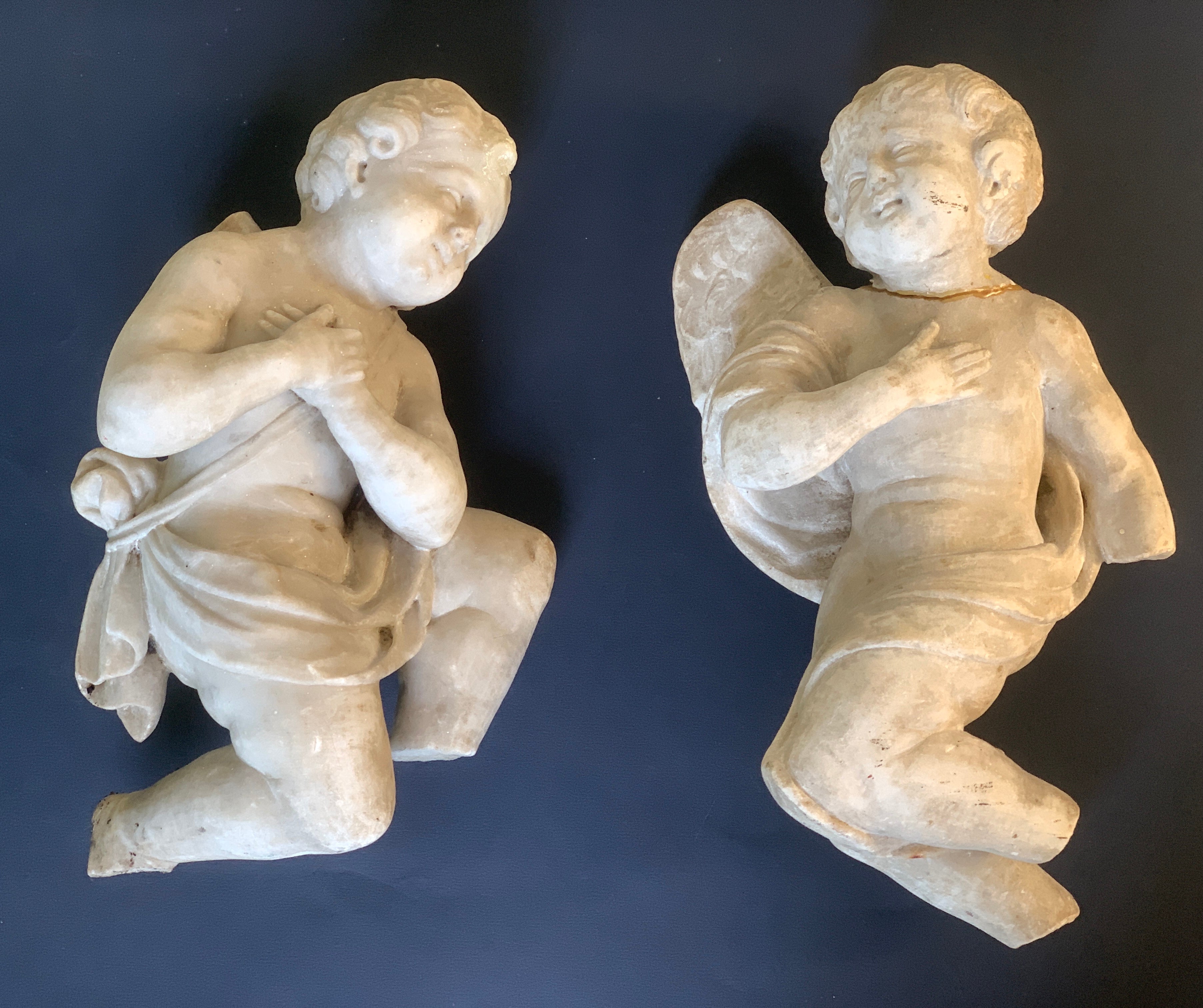 Pair of white marble cherubs