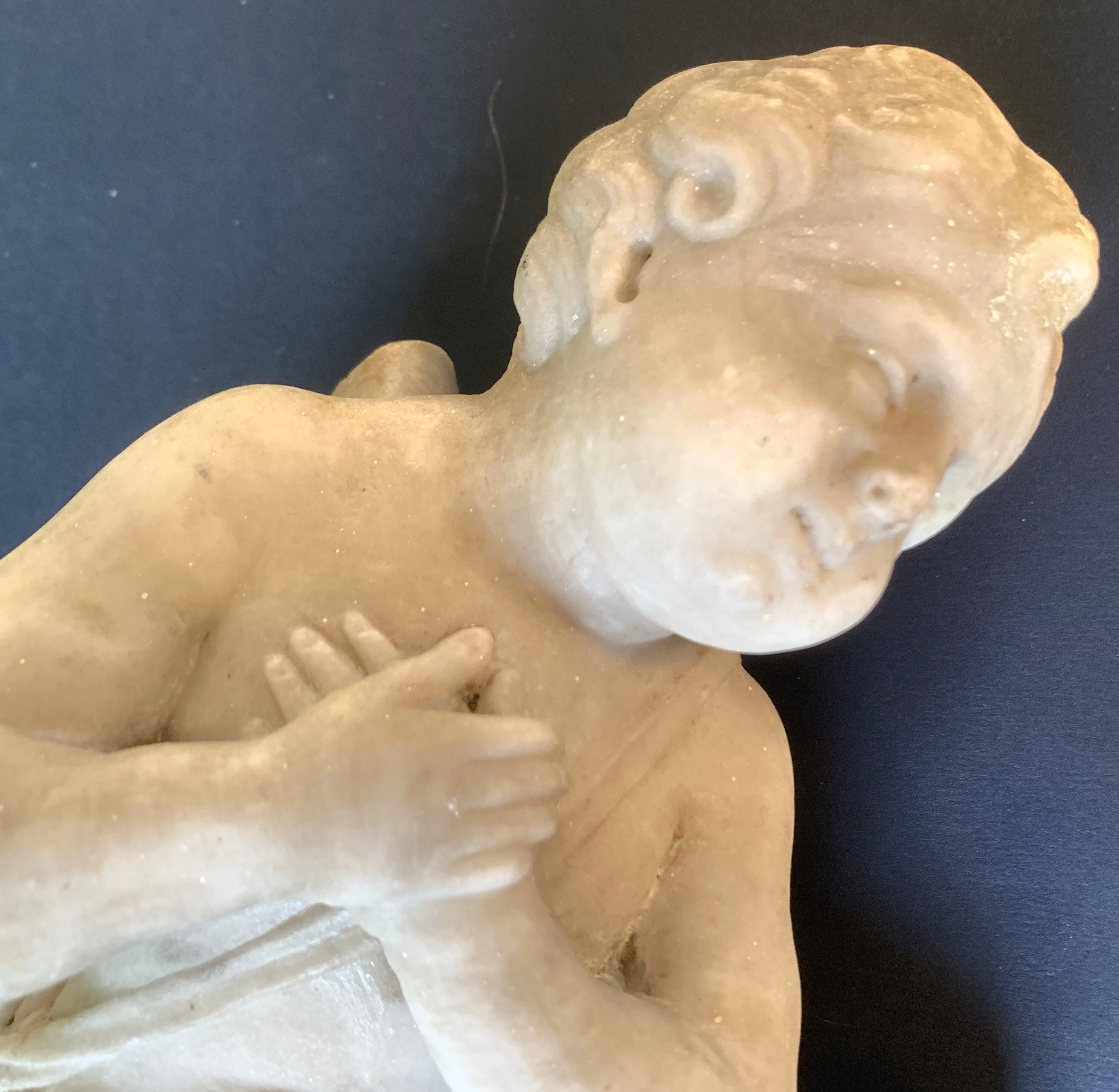 Pair of white marble cherubs