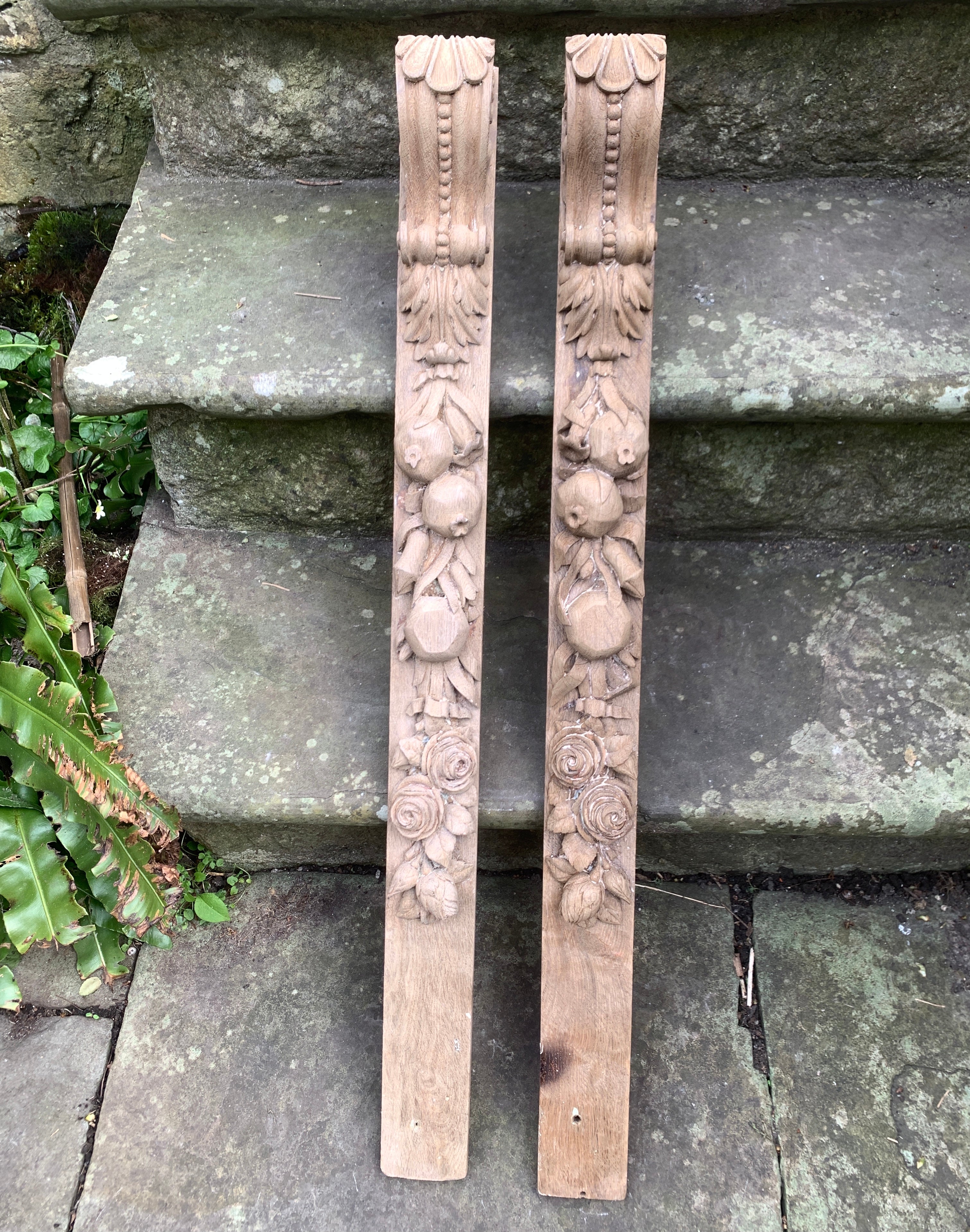 Pair of antique carved oak dcorations  with fruit and flowers.