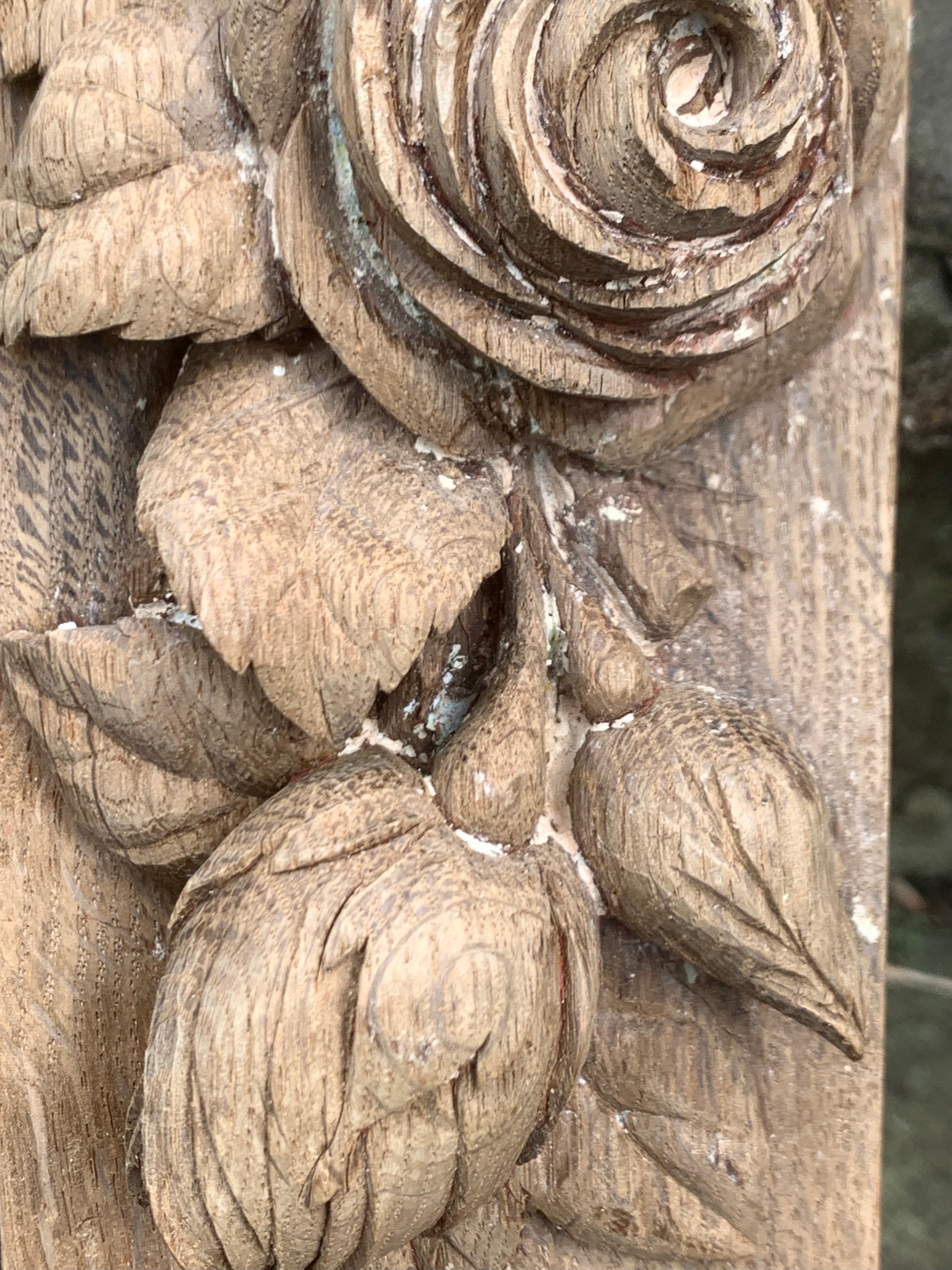 Close-up of detailed wooden carvings on a surface