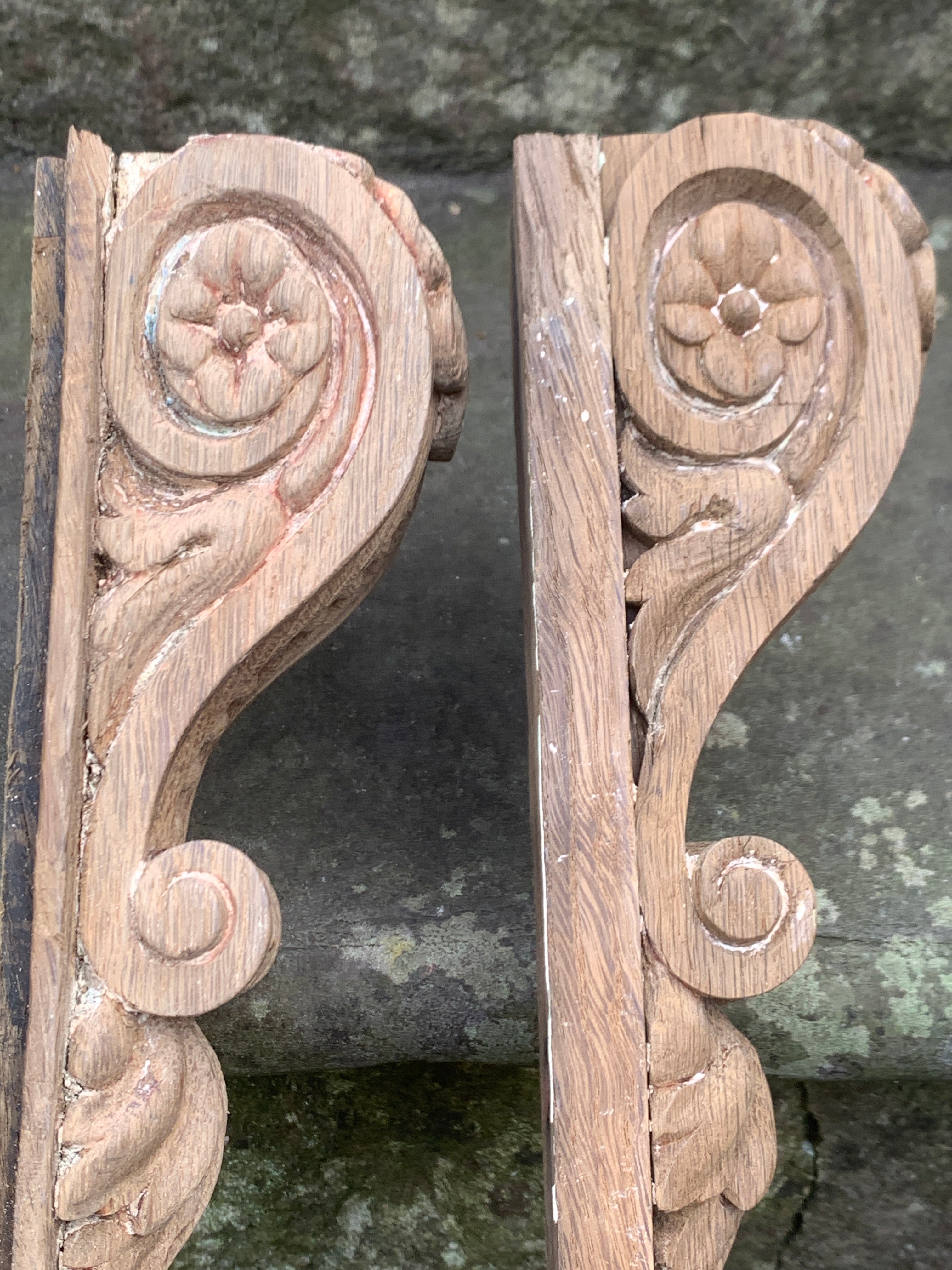 Pair of antique carved oak dcorations  with fruit and flowers.