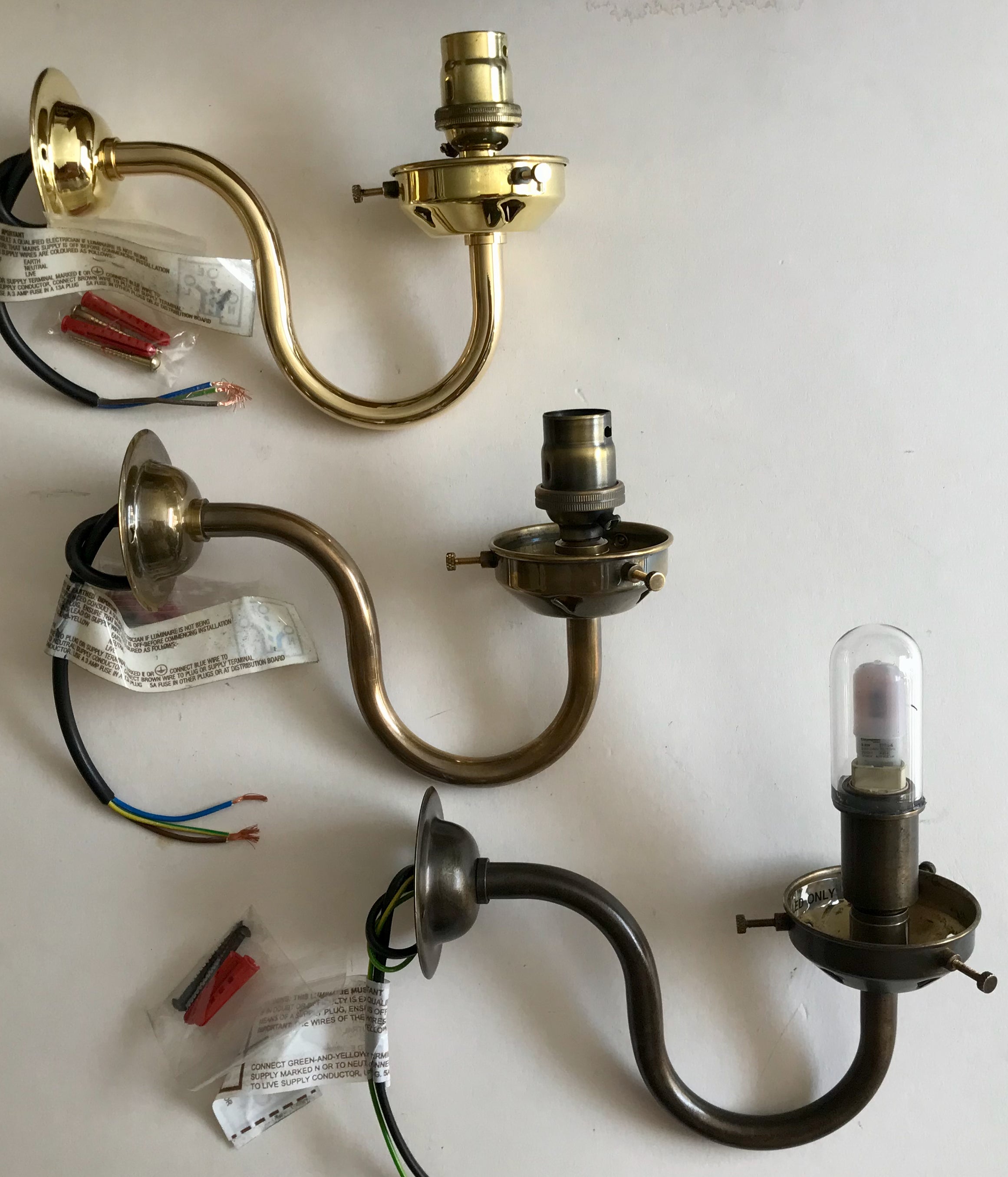 Aged Brass Finish Storm  Wall Light with Clear Glass