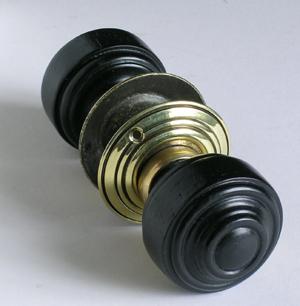 Ebonised Colonial knob set with brass backplates